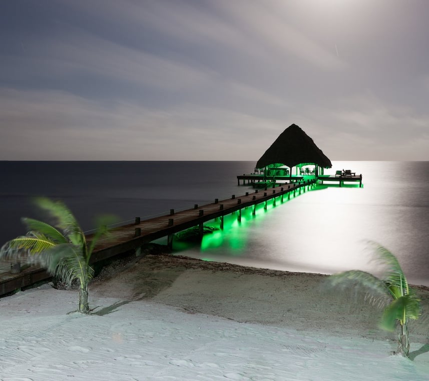bigstock-Beach-And-Dock-With-Lights-56712746