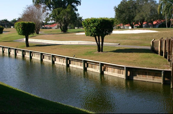 wooden seawall on a golf course